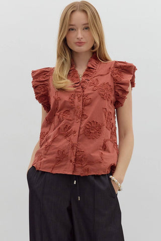 Stylish Entro sleeveless top with embroidered details, ruffle collar, and available in three vibrant colors. Perfect for any occasion.
