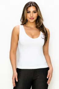 White buttery soft reversible seamless tank on hanger, showcasing sleek design and premium quality for ultimate comfort and versatility.
