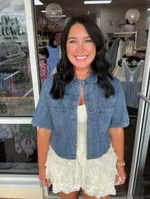 Stylish washed denim cropped short sleeve jacket by Cozy Co, perfect for a casual, trendy look.