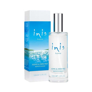 Inis Home & Linen Mist bottle against a calming ocean backdrop, enhancing freshness in your home with Irish-inspired scents.
