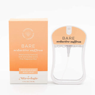 BARE Seductive Saffron Mixologie Moisturizing Body Mist bottle on a vibrant saffron-hued background.