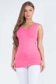 Model wearing HOT PINK buttery soft reversible seamless tank, showcasing its vibrant color and comfortable fit.