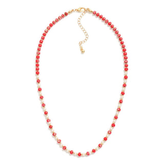 Elegant Gold, Pearl & Red Beaded Necklace with intricate design, perfect for adding sophistication and style to any outfit.