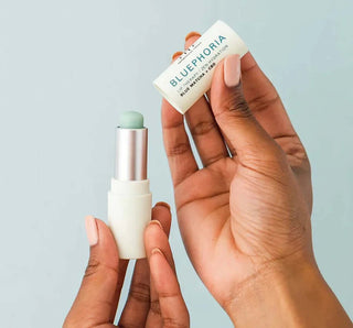 FHF Bluephoria Hi-Bio® Hemp Lip Therapy Balm with soothing natural ingredients in a sleek, compact tube design.