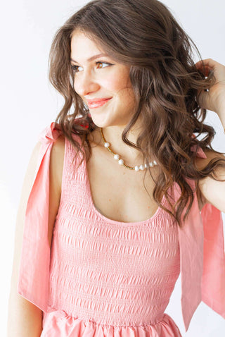 Elegant Lauren Kenzie Vivian necklace with gold beads and pearls, comes with lifetime warranty, displayed on a white background.