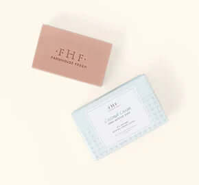 FHF Coconut Cream Shea Butter Soap in stylish cream-colored packaging, enriched for nourishing skin care.