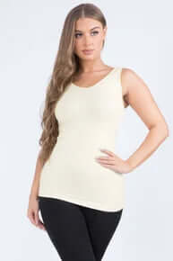IVORY buttery soft reversible seamless tank displayed on mannequin, showcasing stretch fabric and elegant ivory color.