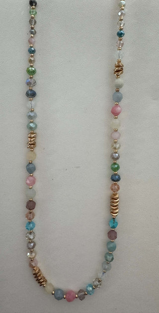 Elegant multicolor faceted crystal necklace with gold beads, perfect for adding a touch of glamour.
