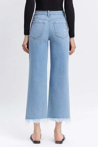 Lovervet T6509 light wash high waist cropped jeans with distressed knees, perfect for a trendy and casual look.