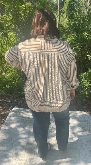 Light blue textured stripe long sleeve button-down shirt with a relaxed fit