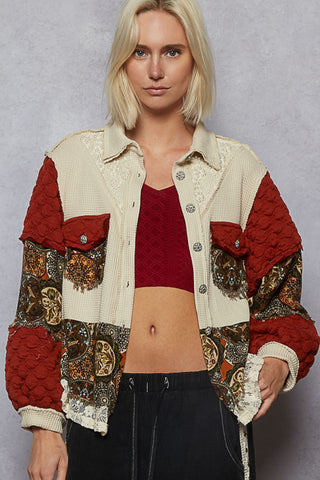Deep brick and oatmeal shacket with pearl accents, featuring a relaxed fit and stylish design.