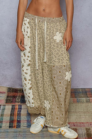 Sand and ivory patchwork jogger with crochet detail and a relaxed fit