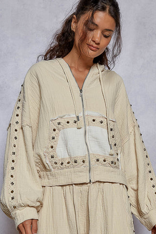 Light gray vintage hoodie jacket with stud trim and a relaxed fit