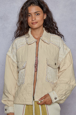 Light blue relaxed fit denim jacket with quilting and lace accents