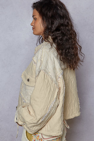 Light blue relaxed fit denim jacket with quilted detailing and lace accents