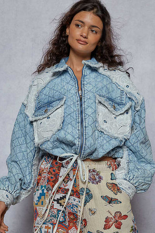 Light blue relaxed fit denim jacket featuring quilting and lace accents