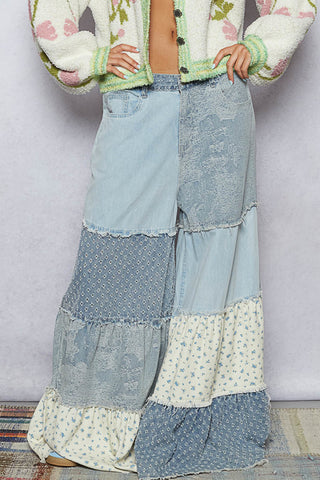 Colorful vintage patchwork palazzo pants with a wide-leg design and a relaxed fit