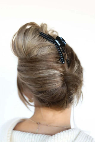 Colorful KAXI MIDI Hold Everything Claw Clip in multiple shades, ideal for versatile hair styling and secure hold.