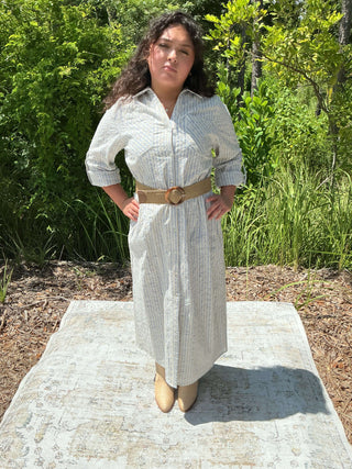 Blue striped midi dress with delicate embroidery and a flattering silhouette