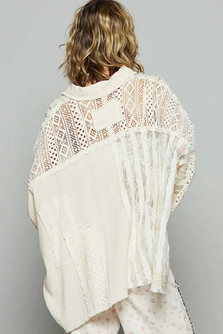 POL Natural Ivory Mixed Fabric Oversized Top on a hanger, showcasing its unique texture and elegant design against a neutral background.