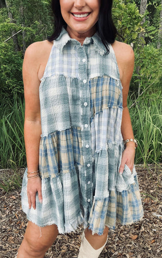 Blue velvet sleeveless button-down tunic dress with collar, available in three colors, on a mannequin. Perfect for stylish layering.