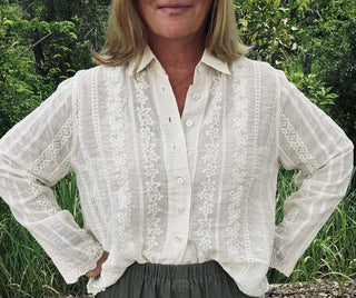 Ivory long sleeve embroidered button-down top Adora with elegant floral details and classic collar for a stylish look.