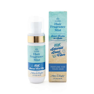 Bottle of AMI Emerald Coast Mixologie Hair Fragrance Mist on a clean white background, highlighting its sleek and modern design.