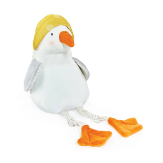 Soft white plush seagull toy with yellow hat, orange beak, gray wings, and rope legs with orange feet.
