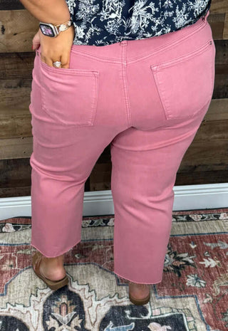 Judy Blue 88983 Dusty Rose Cropped Wide Leg Jeans displayed on a flat lay with a stylish, modern aesthetic.