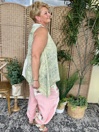 Sage green linen tank top with eyelet details and relaxed oversized fit.