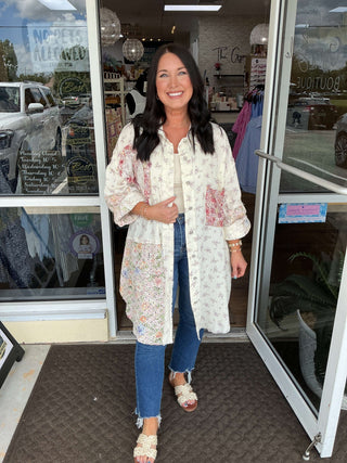 Ivory and floral longline button-down duster by POL, elegant layering piece, perfect for stylish, sophisticated looks.