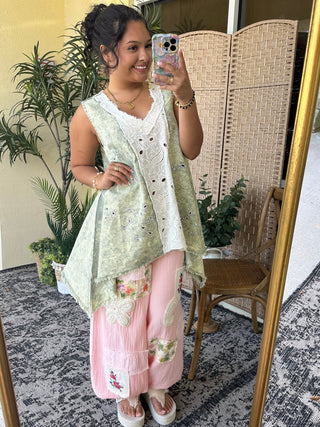 Olive green sleeveless tank top with white lace trim and eyelet details, oversized fit.