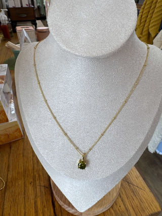 Elegant BIRTHSTONE Necklace by Lauren Kenzie with Lifetime Warranty, featuring a sparkling birthstone pendant and delicate chain.