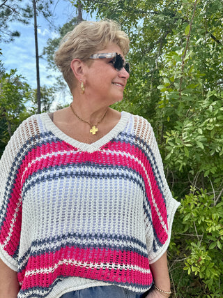 Raspberry, navy and cream striped crochet top with V-neckline and short sleeves.
