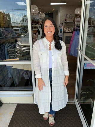 Alt text: "Stylish textured white long line duster top on display, featuring elegant design perfect for layering and versatile wear.