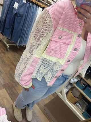 Pink striped shacket with cream lace panels and silver snap buttons.
