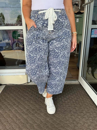 Stylish denim paisley print wide-leg pants with lace drawstring waist by Oddi, perfect for a chic and comfortable look.
