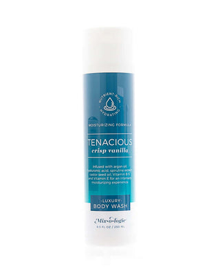 TENACIOUS Luxury Body Wash (8.3 Fl. Oz) in clear bottle with sleek black cap and label, set against a minimalist backdrop.
