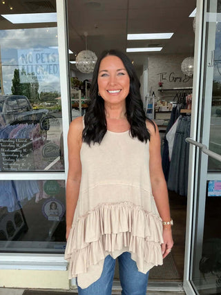 Women's taupe sleeveless tunic top featuring a tiered ruffle hem, designed by Sew In Love, perfect for versatile styling.