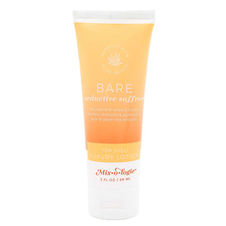 BARE seductive saffron Mixologie Top Shelf Luxury Lotion bottle on white background, showcasing elegant packaging.