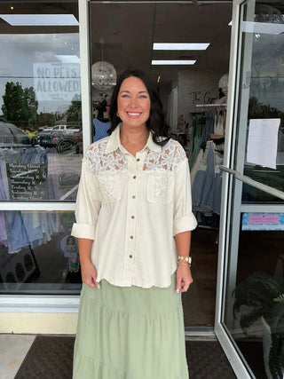 Ivory Pearl Floral Button Down Top by POL, featuring delicate shoulder buttons and a chic design for stylish comfort.