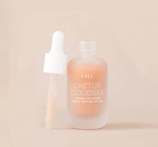 Farmhouse Fresh Cactus Cloudsilk Serum bottle with cactus illustration and pastel pink label, set against a soft white backdrop.