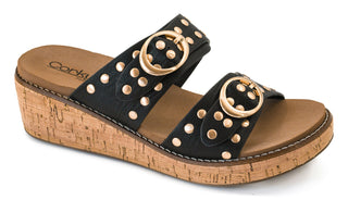 Black leather wedge sandal with gold studs and circular hardware detail on cork platform sole.
