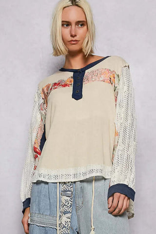 POL Coconut Crochet Sleeve Jersey Top with Navy Detail on hanger against neutral backdrop highlighting crochet design