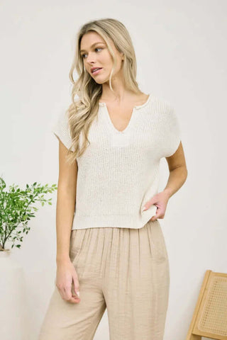 Women's crochet split neck top in various colors, perfect for versatile styling and comfort. Explore multiple color options available!