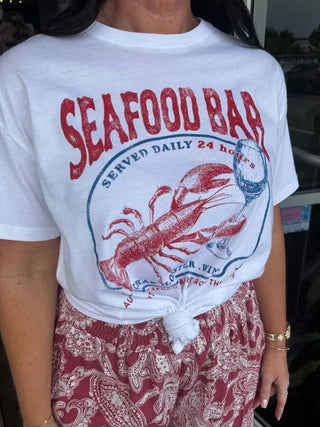 Casual Seafood Bar Graphic Tee Top in navy blue with a playful print, perfect for ocean lovers with a trendy style.