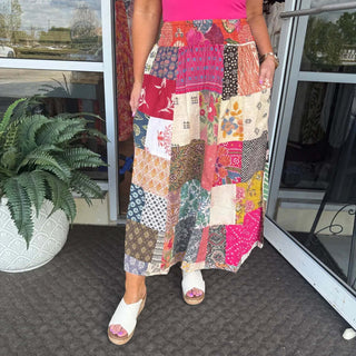 Colorful Paani patchwork elastic waist maxi skirt on final sale, showcasing intricate patterns and a flowing silhouette.