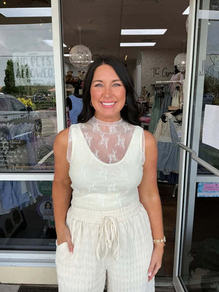 Lace sleeveless layering top in various colors, perfect for stylish layering and versatile fashion choices.