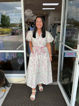Ivory floral bubble sleeve midi dress with lace trim, featuring an elegant silhouette and romantic design. Final Sale item.