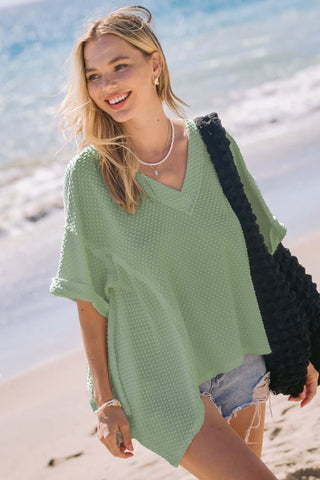 Oddi Top Dotted Jacquard Knit Short Sleeve with Shark Bite Hem, Available in Two Colors.